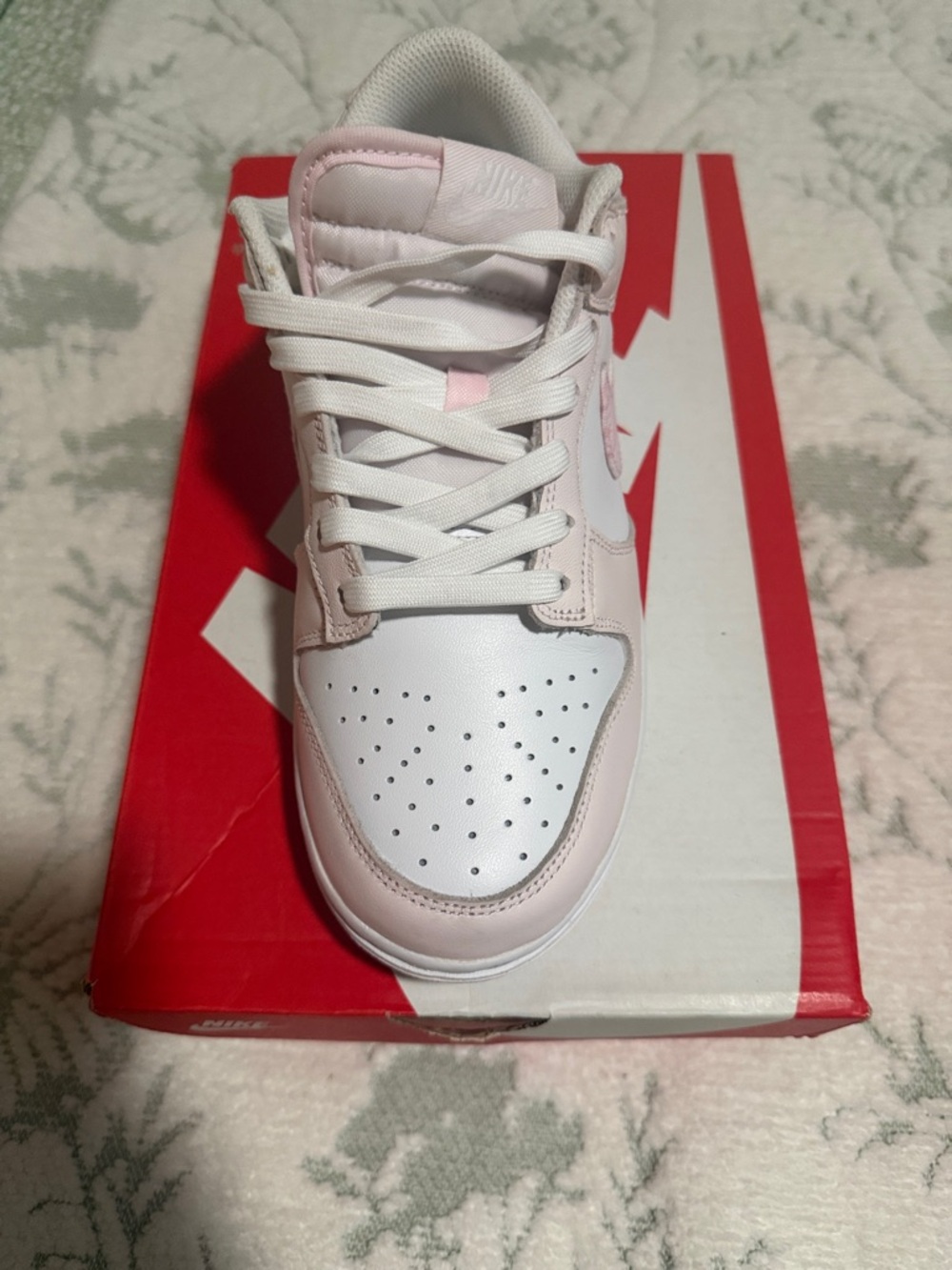 Nike Women's Low-Top Sneaker in White and Light Pink